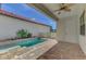 Private plunge pool with brick patio and lush landscaping at 906 E Venice Ave, Venice, FL 34285