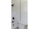 Simple bathroom with white subway tile and black fixtures at 403 Pinewood Ave, Nokomis, FL 34275