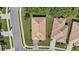 Overhead view of a house with a tan tile roof at 1480 Mossy Oak Dr, North Port, FL 34287