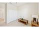 Bedroom with double door closet and wood coffee table at 1480 Mossy Oak Dr, North Port, FL 34287