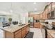 Modern kitchen with granite countertops and stainless steel appliances at 1480 Mossy Oak Dr, North Port, FL 34287