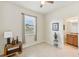 Bright bedroom with ensuite bathroom access at 1480 Mossy Oak Dr, North Port, FL 34287