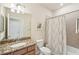 Bathroom with tub, shower, and granite vanity at 1480 Mossy Oak Dr, North Port, FL 34287