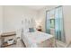 Bedroom with a full-size bed and ocean decor at 1480 Mossy Oak Dr, North Port, FL 34287