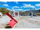 Modern outdoor sculptures with unique designs and textures at 875 Indian Beach Dr, Sarasota, FL 34234