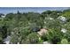 Aerial view of a house near the water at 875 Indian Beach Dr, Sarasota, FL 34234
