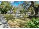 Relaxing community lawn with shaded seating areas perfect for socializing at 875 Indian Beach Dr, Sarasota, FL 34234