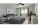 Bedroom with bed, dresser, and window with curtains at 2704 60Th Avenue S Plz # 2704, Bradenton, FL 34207