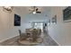 Dining room with round table and chairs, living room view at 2704 60Th Avenue S Plz # 2704, Bradenton, FL 34207