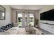 Living room with comfy sofa and sliding doors to patio at 2704 60Th Avenue S Plz # 2704, Bradenton, FL 34207