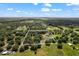 Aerial view of property showing house and surrounding land at 28055 Gopher Hill Rd, Myakka City, FL 34251