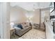 Relaxing home office features a sofa, window, and built-in workspace at 7922 Tybee Ct, University Park, FL 34201