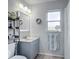 Clean bathroom with vanity, mirror, and shower at 2843 Abbotsford St, North Port, FL 34287