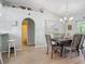Dining room features a table, chairs, and access to the bathroom at 2843 Abbotsford St, North Port, FL 34287