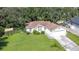 Single Gathering home with a fenced yard, nice lawn, and driveway at 2843 Abbotsford St, North Port, FL 34287
