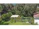 Large backyard with fenced area and a shed at 2843 Abbotsford St, North Port, FL 34287