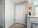 Light and bright entryway with wood-look floors at 2843 Abbotsford St, North Port, FL 34287