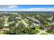 Neighborhood with houses, canal, and lush greenery at 2843 Abbotsford St, North Port, FL 34287