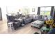 Relaxing living room with sectional sofa and large ottoman at 2843 Abbotsford St, North Port, FL 34287