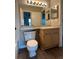 Bathroom with a toilet and updated vanity at 4025 Crockers Lake Blvd # 11, Sarasota, FL 34238