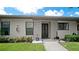 Inviting condo exterior with landscaping and walkway at 2704 60Th Avenue S Plz # 2704, Bradenton, FL 34207