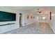 Living area with hardwood floors and views into kitchen and bathroom at 2704 60Th Avenue S Plz # 2704, Bradenton, FL 34207
