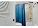 Bathroom with shower/tub combo and blue curtain at 2704 60Th Avenue S Plz # 2704, Bradenton, FL 34207