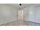 Bright bedroom with ceiling fan and grey vinyl flooring at 2704 60Th Avenue S Plz # 2704, Bradenton, FL 34207