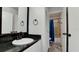 Clean bathroom with dark vanity and updated fixtures at 2704 60Th Avenue S Plz # 2704, Bradenton, FL 34207