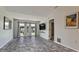 Bright living room with gray flooring and access to a patio at 2704 60Th Avenue S Plz # 2704, Bradenton, FL 34207