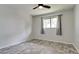 Comfortable bedroom with ceiling fan and window coverings at 2704 60Th Avenue S Plz # 2704, Bradenton, FL 34207