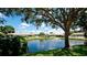 Peaceful pond and fountain view with lush foliage at 2704 60Th Avenue S Plz # 2704, Bradenton, FL 34207