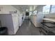 Shared laundry facility with several washers and dryers at 6023 Hibiscus Dr # 177, Bradenton, FL 34207