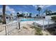 Community pool with surrounding patio and landscaping at 6023 Hibiscus Dr # 177, Bradenton, FL 34207