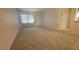 Spacious living room with carpeted floors at 6023 Hibiscus Dr # 177, Bradenton, FL 34207