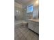 Clean bathroom featuring a bathtub, toilet, and vanity with storage at 6023 Hibiscus Dr # 177, Bradenton, FL 34207