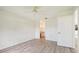 Bedroom with ceiling fan and wood-look flooring at 2708 60Th Avenue W Ter # A, Bradenton, FL 34207