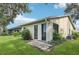Backyard with patio and lush landscaping at 2708 60Th Avenue W Ter # A, Bradenton, FL 34207