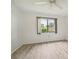Bright bedroom with wood-look floors and a window with a view at 2708 60Th Avenue W Ter # A, Bradenton, FL 34207