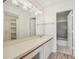 Bathroom with vanity, mirror, and tub at 2708 60Th Avenue W Ter # A, Bradenton, FL 34207