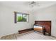 Bedroom with wood-look flooring and window at 2708 60Th Avenue W Ter # A, Bradenton, FL 34207
