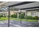 Exterior view of condo with carport and landscaping at 2708 60Th Avenue W Ter # A, Bradenton, FL 34207