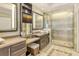 Elegant bathroom with double vanity and large walk-in shower at 915 Seaside Dr # 613 Weeks 28-29, Sarasota, FL 34242