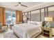 Main bedroom with ocean view, king-size bed, and seating area at 915 Seaside Dr # 613 Weeks 28-29, Sarasota, FL 34242