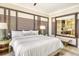 Spacious bedroom with king bed and en-suite bathroom access at 915 Seaside Dr # 613 Weeks 28-29, Sarasota, FL 34242