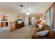 Cozy living room featuring a comfy couch and rocking chair at 1810 67Th Street E Ct, Bradenton, FL 34208