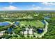 Large park with walking trails, sports courts, and pond views at 6340 Robin Cv, Lakewood Ranch, FL 34202