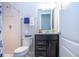 Clean bathroom with dark vanity and shower/tub combo at 11721 Brighton Knoll Loop, Riverview, FL 33579