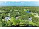 Aerial view of neighborhood with lake access at 907 136Th E St, Bradenton, FL 34212