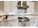 Modern kitchen with stainless steel appliances and stylish backsplash at 4803 Cabreo Ct, Bradenton, FL 34211